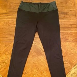 Black leggings with faux leather waist band.